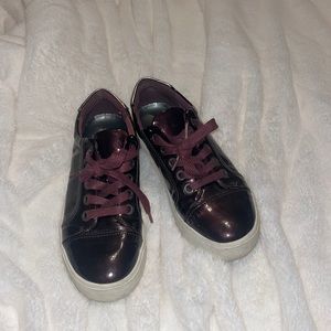 Shiny dark purple sneakers